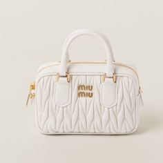 Miu Miu Arcadi Matelasse Leather Mini Bag White Height: 10.3 Cm Width: 15.3 Cm Depth: 4.5 Cm Aesthetic Bags, Eco Bags, Miu Miu Bag, Girly Bags, Designer Shoulder Bags, Metallic Logo, Leather Mini, White Bag, Lollipop