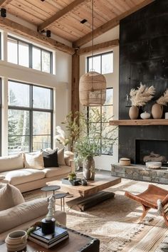 Cozy rustic living room with stone fireplace, wooden beams, and plush leather sofa Modern Lodge Living Room, Living Room Designs Modern Luxury, Mountain Living Room, Lodge Living Room, Person Picture, Living Room Designs Modern, Western Living Room, Modern Mountain House, Modern Lodge