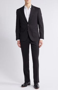 Crisp and classic, this suit tailored from black wool features traditional detailing and makes a versatile, polished addition to any formal wardrobe. Jacket has notched lapels; four-button cuffs; chest pocket; flap pockets; side vents Trousers have zip fly with button-tab closure; slant pockets; back button-welt pockets Jacket is lined; trousers are lined to the knee Unhemmed 100% wool Dry clean Made in Canada Classic Tuxedo With Hidden Button For Work, Classic Tuxedo With Hidden Button Closure For Work, Classic Tuxedo With Suit Collar For Work, Classic Slim Fit Double Breasted Suit For Formal Occasions, Classic Tuxedo For Formal Events, Tailored Classic Tuxedo For Work, Tailored Tuxedo Suit For Business, Classic Black Suit And Tie Accessories For Business, Classic Black Suit And Tie Accessories For Business Meetings