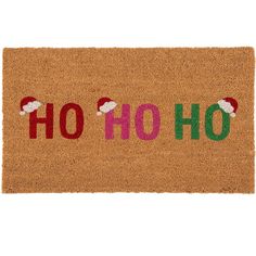 a door mat with the word ho ho written in red, green and pink on it