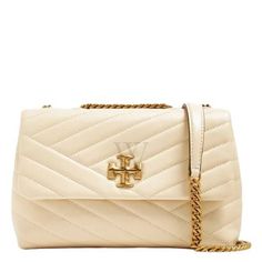 Tory Burch Ladies Shoulder Bag. SKU: 90452-122. Color: New Cream. Size: H: 5.9" x L: 8.9" x D: 3.2". Tory Burch New Cream Kira Chevron Small Convertible Shoulder Bag. The Kira small shoulder bag is crafted from nappa leather with a cotton herringbone lining and a gold-tone hardware. It features a flap with magnetic snap closure, 2 interior slit pockets, 1 interior zipper pocket, convertible chain shoulder strap with 22.2" drop, and a beveled Double T hardware. Leather 100%. Kira Chevron, Versace Watch, Denim Shoes, Crossbody Messenger Bag, Simple Bags, Wallet Chain, Small Shoulder Bag, Leather Chain, Nappa Leather