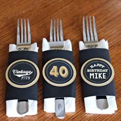 four black and white napkins with gold foil on them that say happy birthday mike