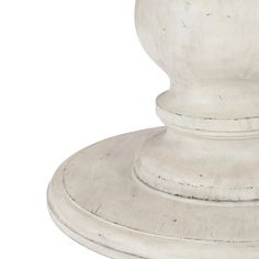 an old white wooden pedestal on a white background