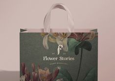 a paper bag with flowers printed on it