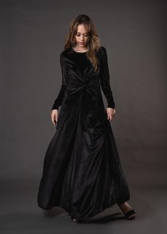 This floor-length black velvet dress is cozy and glam! With long sleeves, elastic and a flattering knot detail at the waist.Machine wash cold and hang dry.Size Chart:XS : 0/2S : 4/6M : 8/10L: 12/14XL: 16/18 Velvet Long Sleeve Maxi Dress For Evening, Velvet Maxi Dress For Fall, Elegant Velvet Maxi Dress For Fall, Knot Dress, Black Velvet Dress, Velvet Dress, Black Velvet, Floor Length, Handmade Natural