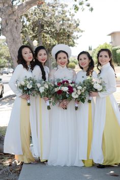 the bridesmaids are all dressed in white and yellow