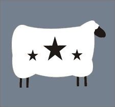 a black and white sheep with five stars on it