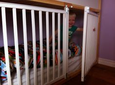 a small child is playing in his crib