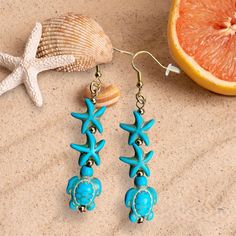 Are you in a beach mood? Our turtle and starfish earrings are fun and unique and make you feel like summer on any occasion. The turquoise pair has nickel-free ear hooks and the coral pair has 18K gold plated ear hooks, both are good for anyone with sensitivities to some metals. The earrings are light weight and comfortable to wear all day. Your earrings will arrive in a silver gift box tied with a colorful fabric ribbon for easy gift giving. To see more jewelry and gifts in our Etsy shop, please Hot Gril, Beach Mood, Turtle Jewelry, Earrings Beach, Colorful Fabric, Silver Gift Box, Starfish Earrings, Turtle Earrings, Summer Earrings