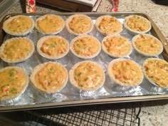 there are many small pies on the baking sheet ready to be baked in the oven