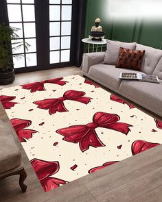 a living room area rug with red bows on it