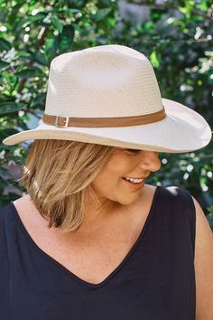 The Hamptons hat is an elegant and practical addition to any wardrobe this spring/summer season! Handmade from 100% Iraca Palm in the rolling hills of Colombia, this super-soft hat is robust in design, yet easy to manipulate into your preferred shape using steam or water. The all-natural look instantly creates a complete outfit, moving easily from daytime beach activities to nighttime summer BBQ functions. With a simplistic design, this hat is not only suitable for all with a leather strap to de Cream Straw Hat With Curved Brim For Travel, Cream Straw Hat For Travel With Curved Brim, Cream Curved Brim Straw Hat For Travel, Spring Wide Brim Fedora For Everyday, Everyday Wide Brim Fedora For Spring, Spring Everyday Wide Brim Fedora, Everyday Brimmed Fedora For Spring, White Wide Brim Felt Hat For Summer, Spring Everyday Brimmed Fedora