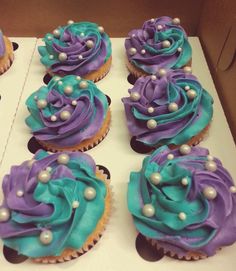 cupcakes with purple and blue frosting are on the twitter page for pinter