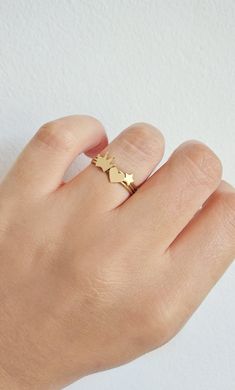 14K 9K Solid Gold Heart Ring, Delicate gold ring, Dainty Rose Gold heart ring, Love Romatnic Jewelry, Minimalist Stacking gold ring, Gift for her, Stackable gold ring, 14K rose gold ring, 9K rose gold ring, 9K gold ring, FREE EXPRESS SHIPPING Dainty 14K or 9K solid gold ring with a tiny heart. Love is always around, hear its whispers and embrace it. <3 More dainty gold rings here: https://www.etsy.com/shop/WhisperGold?ref=seller-platform-mcnav&section_id=23760120 ------------------------- Dainty Tiny Gold Heart Ring, Dainty Gold Midi Rings For Valentine's Day, Delicate Gold Heart Midi Rings, Gold Heart-shaped Midi Rings In 14k Gold, Dainty Yellow Gold Midi Rings For Valentine's Day, Dainty Rose Gold Heart Ring For Mother's Day, Delicate Gold Stackable Rings For Valentine's Day, Delicate Gold Midi Rings For Valentine's Day, Gold Dainty Heart Ring For Mother's Day