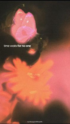 a pink flower with the words time waits for no one