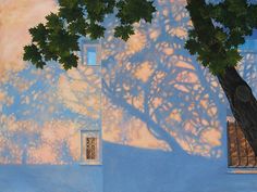 a painting of a tree casting a shadow on the wall next to a window and door