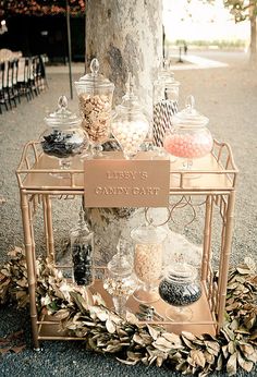 a cart filled with lots of different types of candies