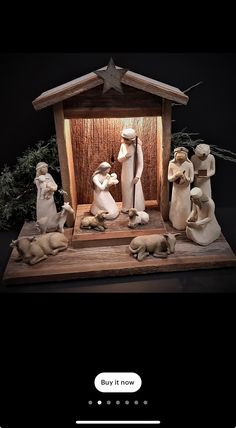 a nativity scene is displayed on a tabletop