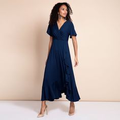 Feel inspired with our new and fabulous Waterfall Dress in stunning navy blue. This faux wrap midi dress delivers a flounce with frills in a chic silhouette that is flattering and understated.Whatever your occasion celebrate in confident style, knowing that you look your absolute best. This dress runs large, we recommend you select the size accordingly.Navy Blue shade in premium viscose jerseyFaux wrap skirt with ruffle featuresGathered cross-over neckline front & backBell shaped sleevesPull-on- Flattering Wedding Dress, Waterfall Dress, Annie Dress, Dresses Occasion, Faux Wrap Skirt, Confident Style, Mob Dresses, Wrap Midi Dress, Navy Midi Dress