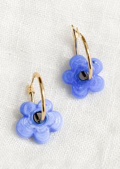 Material 18k gold plated / Murano glass flower Size Approx. 1 1/8" tall Closure Clasp closure Origin Brooklyn, New York, United States Ceramic Earrings, Personal Image, Floral Hoops, Boho Style Jewelry, Ceramic Earring, Stylish Earring, Bow Earrings, Earring Sale, Brooklyn New York