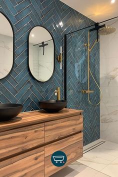 a bathroom with two round mirrors above the sinks and a wooden counter top under it