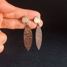 These Hammered copper earrings are a stunning and unique accessory. I made them in pure copper and sterling silver for the post. The havethat rustic touch that would be perfect eith your boho outfit. The perfect gift for that special person. All the items of my store are designed and manufactured by me. Beautiful pieces handmade one by one in an artistic way and not mass produced. Unique pieces made with a lot of detail and love. Due to this there might be slight differences in each piece. 💯 I Brown Hammered Copper Earrings, Hand Forged Bronze Rustic Earrings, Rust Colored Hammered Copper Jewelry, Hand-forged Copper Earrings In Rust Color, Hammered Rose Gold Copper Earrings, Rustic Copper Earrings In Rust Color, Rustic Hammered Copper Earrings, Rustic Hand Forged Earrings, Rustic Rust-colored Copper Earrings