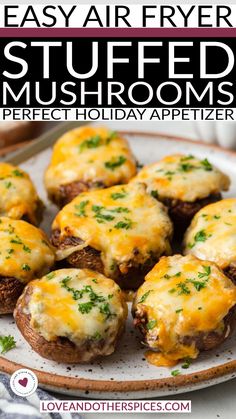 stuffed mushrooms on a plate with text overlay that reads easy air fryer stuffed mushrooms perfect holiday appetizer