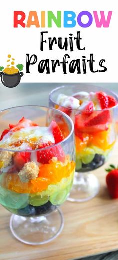 rainbow fruit parfaits in glass bowls with strawberries on the side