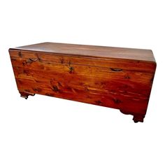 a large wooden chest sitting on top of a white background