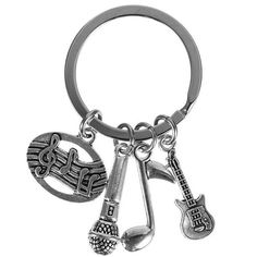 a key chain with musical instruments on it