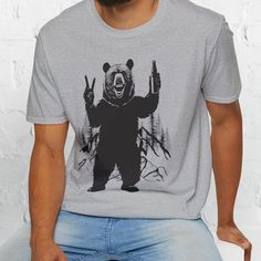 Funny Beer Drinking Bear T-Shirt, Party Animal Alcohol Tee, Brewer Gift, Fun Drinking Shirt, Fun Beers Tee, Bears Lover Gift, Humor Shirt. For those who love beer and a good laugh, meet your new party animal: this beer-drinking bear shirt! Whether you're at the brewery, backyard BBQ, or just relaxing with a cold one, this tee is perfect for those who want to show off their love for brews in style. It's the ultimate shirt for beer lovers, party animals, and anyone who appreciates a bear with grea Beer Shirts Men, Beer T-shirts, Casual White T-shirt With Bear Design, Affordable Casual T-shirt With Bear Design, Beer Drinking, Funny Beer, Bear Design Graphic Tee Short Sleeve T-shirt, Beer Humor, Party Animals