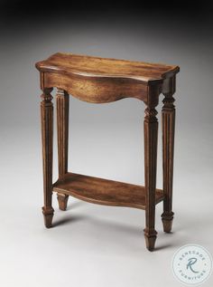 a wooden table with two shelves on the top and one shelf below it, against a white background