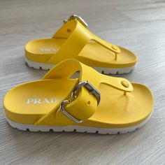 Prada Calzarure Donna Rubber Slides Size: 38 Condition: Excellent Like New Includes Original Box, Cards, And Prada Tissue Paper (Worn Once For 2 Hours In Doors) Color: Yellow (Sole) Trendy Yellow Sandals With Buckle Closure, Designer Yellow Sandals For Beach, Designer Yellow Sandals For The Beach, Box Cards, Swimwear Bottoms, Soft Yellow, Instagram And Snapchat, Prada Shoes, Swimwear Accessories