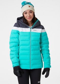 A cozy layer that's versatile and sleek for skiing or wearing in town  the waterproof and windproof women's Helly Hansen Imperial Puffy insulated jacket is comfortable and warm with structured fabric. Functional Winter Puffer Jacket For Skiing, Sporty Puffer Jacket For Ski Season, Nylon Puffer Jacket For Skiing, Functional Puffer Jacket For Ski Season, Sporty Winter Outerwear For Snow, Functional Nylon Puffer Jacket For Skiing, Hestra Gloves, Picture Organic Clothing, Structured Fabric