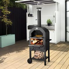 an outdoor wood burning oven on a deck