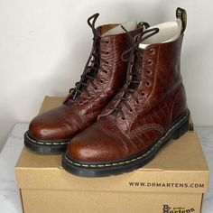 Dr. Martens "Croc Pascal" Boots. Classic Lace Up Combat Boots, With Iconic Rubber Outsole. Dark Brown "Croco Vibrance" Embossed Leather Upper, Black Laces. Eu Size 43, Us Men's Size 10. Like New, Never Worn, No Visible Signs Of Significant Wear That I Can See. Includes Original Box, Smoke Free Home. Leather Shoes With Crocodile Pattern And Round Toe, Brown Leather Boots With Crocodile Pattern, Leather Ankle Boots With Crocodile Pattern, Brown Crocodile Pattern Classic Boots, Brown Leather Shoes With Crocodile Pattern, Classic Textured Leather Boots, Casual Leather Boots With Crocodile Pattern, Vintage Brown Lace-up Leather Boots, Brown Textured Leather Boots With Round Toe