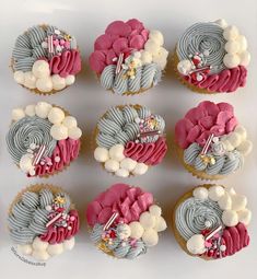 cupcakes decorated with pink, blue and white frosting