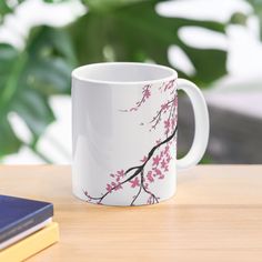 11oz ceramic mug featuring wraparound print. Available in two shapes. Dishwasher safe. The newest design is this very cute pink Japanese Cherry Blossom Tree design. Such a beautiful simple design. Hope you enjoy :) Japanese Cherry Blossom Tree, Tree T Shirt, T Shirt Print Design, T-shirt Print Design, Blossom Tree, Japanese Cherry Blossom, Pottery Cups, Shirt Print Design, Cherry Blossom Tree