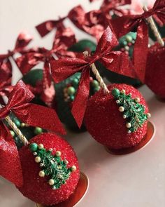 strawberries decorated with green and red decorations