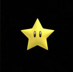 a yellow star with two eyes in the dark