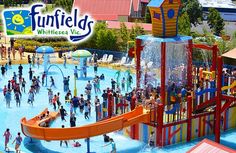 an overhead view of a water park with children playing