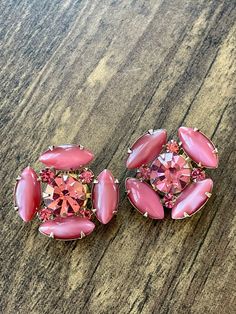 "Swarovski Rhinestone and Pink Bead Clip On Earrings | Clip On Earrings | Femme Earrings | Pink Rhinestone Earrings  Dimensions: 1.15\" Condition: Beautiful vintage condition.  Details:  * Earrings are not signed  * Swarovski Rhinestone and Pink Bead Clip On Earrings All of the items in my shop were found on some sort of vintage hunting adventure. I love searching through because you really never know what you will find. All item descriptions are short and to the point but if you would like addi Affordable Pink Dangle Clip-on Earrings, Affordable Pink Clip-on Earrings For Party, Luxury Pink Formal Clip-on Earrings, Cheap Pink Clip-on Earrings For Party, Cheap Pink Clip-on Earrings, Pink Flower Clip, Earrings Pink, Flower Clip, Pink Beads