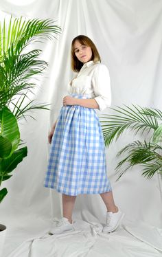 "Baby Blue check high waist full gathered skirt. Perfect for casual outfits and special ocasions with pair of trainters or high heels. 100% cotton.  Elastic at the back of waist.  Two side pockets. Midi lenght about 70cm + 5 cm waistband. Handmade in UK.  Model wears size S.  HOW TO CHOOSE A SIZE ?   Using a measuring tape, measure the smallest part of your waist.  SIZE CHART: (CM) XS - W: 66 CM S - W: 70 CM M - W: 74 CM  L - W: 78 CM  XL - W: 82 CM  CARE INSTRUCTIONS: Hand wash only, do not bleach, hang dry, do not tumble dry, press with a cool iron on the reverse side.  Please message me before purchasing so I can check availability. If you wish this skirt in any other fabric, shorter or longer \"send message to seller\" and we can try to make something especially for you. *Depends on co Waist Size Chart, Polka Dots Skirt, Classic Casual Style, Full Gathered Skirt, Fluffy Jacket, Gingham Skirt, Dot Skirt, Red Gingham, Style Skirt