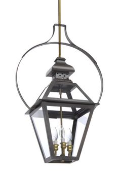 an outdoor hanging lantern with three lights on the front and back sides, attached to a metal pole