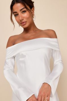 Look effortlessly sensational all through the night with the Lulus Luxurious Vision White Satin Off-the-Shoulder Mini Dress! Sleek woven satin shapes this ultra-flirty dress that features a foldover, off-the-shoulder neckline (with hidden no-slip strips) and elegant long sleeves. The figure-skimming, slip-style silhouette falls to a perfectly sultry mini hem. Hidden side zipper. Fit: This garment fits true to size. Length: Mid-thigh. Size medium measures 33.50" from top to bottom. Bust: Great fo Elegant Off-shoulder Fitted Satin Dress, Elegant Off-shoulder Satin Dress For Night Out, Elegant Off-shoulder Satin Party Dress, Fitted Satin Off-shoulder Dress For Cocktail, Elegant Fitted Off-shoulder Satin Dress, Off-shoulder Satin Dress For Date Night, Off-shoulder Satin Dress For Summer Nights, Sleek Off-shoulder Evening Dress, Fitted Satin Off-shoulder Wedding Dress