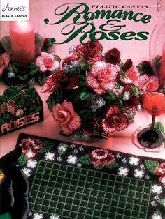 an image of a table setting with flowers and placemats on it, candles and napkins