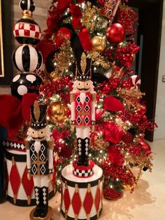 a christmas tree decorated with black and red ornaments