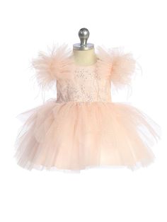 Make your little one feel like a princess in our Marianna Baby Girl Glitter Tulle Party Pageant Dress! This stunning dress features a sparkling glitter bodice with delicate lace applique, fluffy sleeves with feathers for an extra touch of elegance, and a concealed zipper in the back for easy dressing. Perfect for special occasions, photoshoots, or just adding a touch of glamour to your little one's wardrobe. Get ready to turn heads and create memories that last a lifetime with this beautiful dre