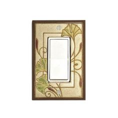 a decorative light switch plate with a floral design on it's cover and a single outlet