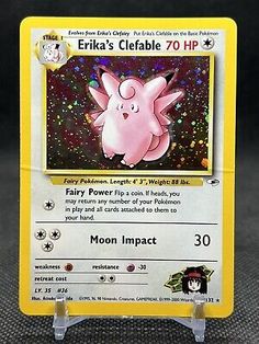 a pokemon card with an image of a pink pig on it's back side